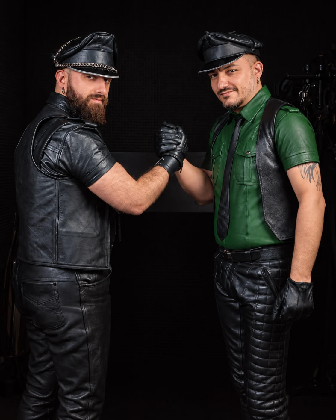 Gius and Antonello joined by the handshake in the leather shoot